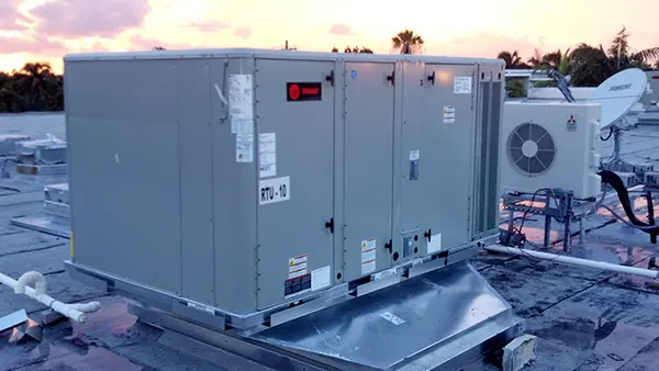 Outdoor HVAC unit at a Walgreens store, showing the unit's exterior and surrounding environment.